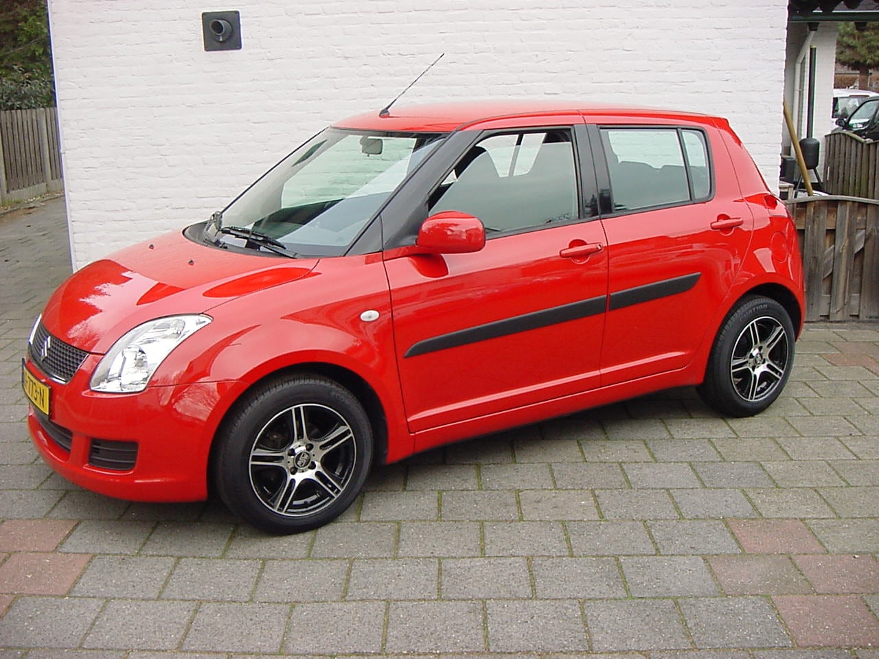 Suzuki Swift - 1.3 5drs comfort airco lmv esp zeer mooi - AutoWereld.nl