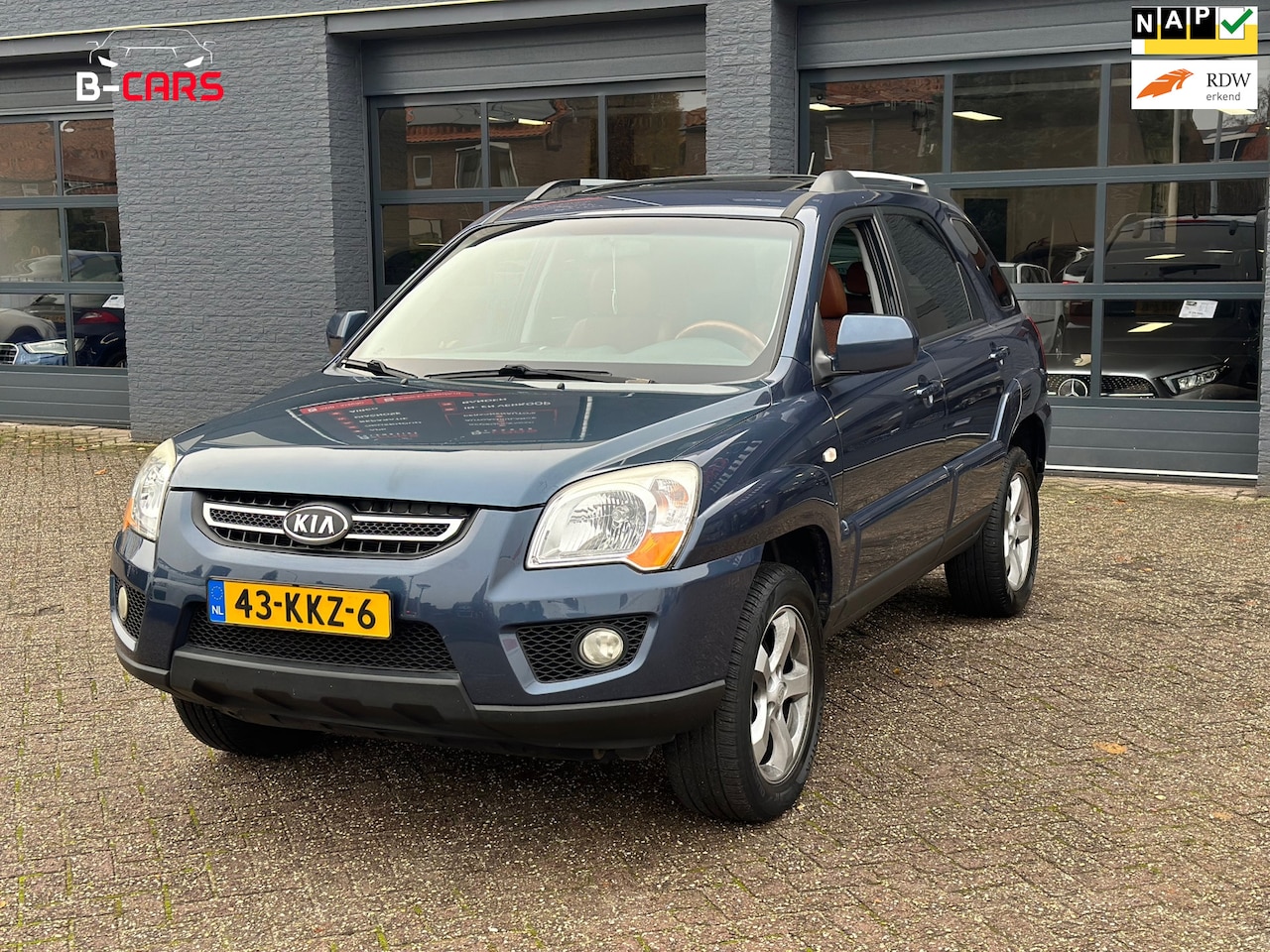 Kia Sportage - 2.0 CVVT Fifteen LEER|STOELVW|CRUISEC|SCHUIFDAK|NAP| - AutoWereld.nl