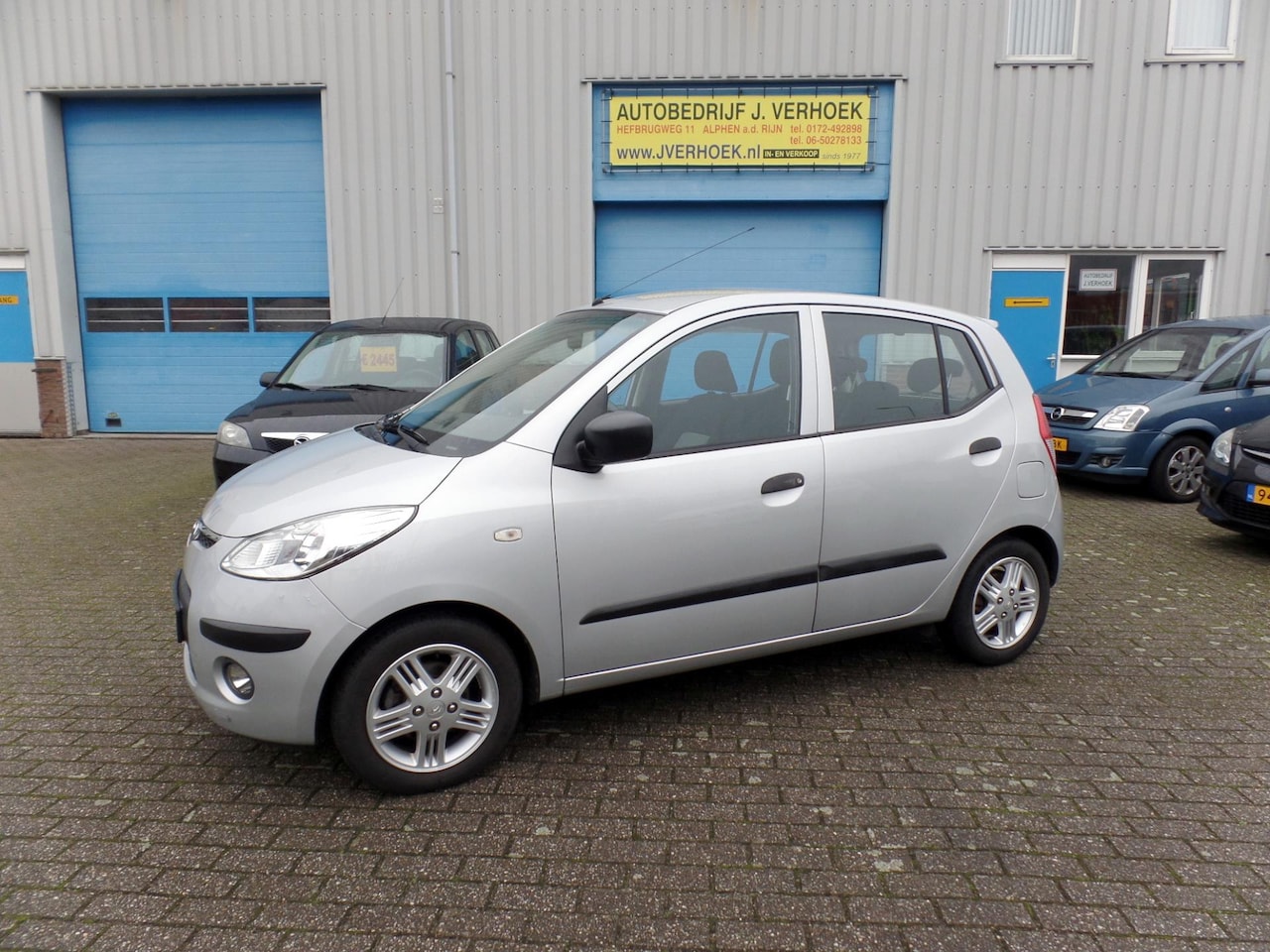 Hyundai i10 - 1.1 Active Orange Babies AIRCO - AutoWereld.nl