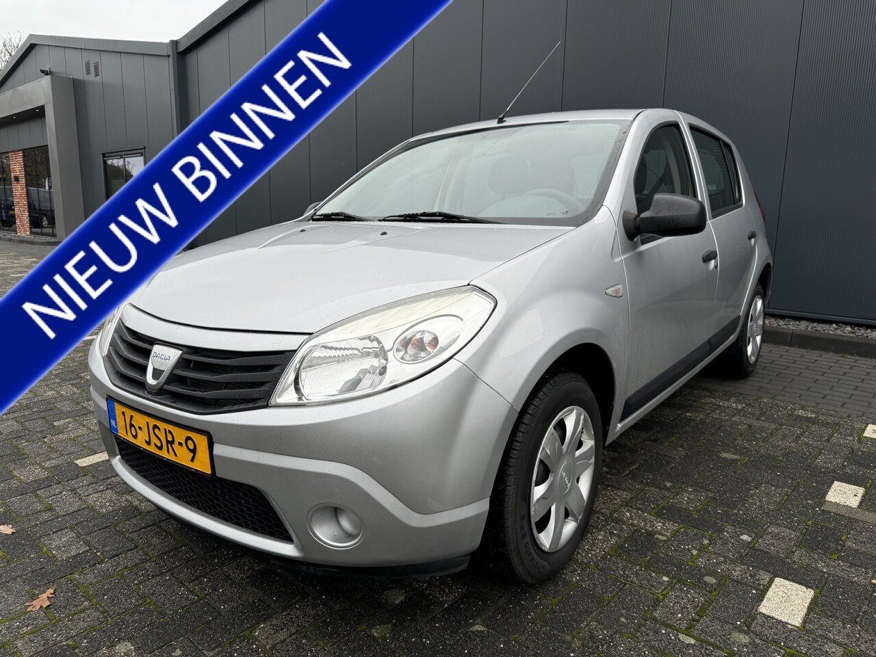 Dacia Sandero - 1.2 Ambiance HOGE INSTAP. ZEER NET. NW. APK. AIRCO.RIJKLAAR. - AutoWereld.nl