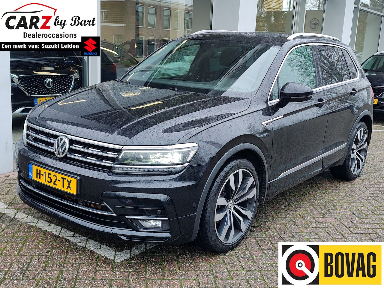 Volkswagen Tiguan - 1.5 TSI ACT HIGHLINE BUSINESS R DSG Open dak | Leder | Trekhaak | Stoelverwarming - AutoWereld.nl