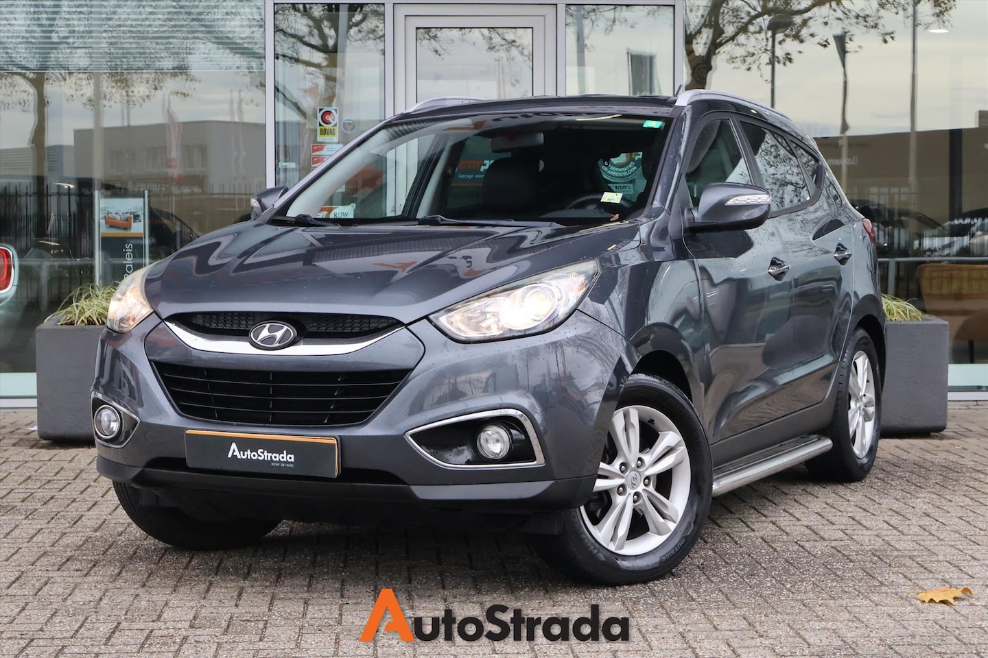 Hyundai ix35 - 2.0 I Style CVVT 2WD AUT | Navi | Cruise | Climate | Trekhaak - AutoWereld.nl