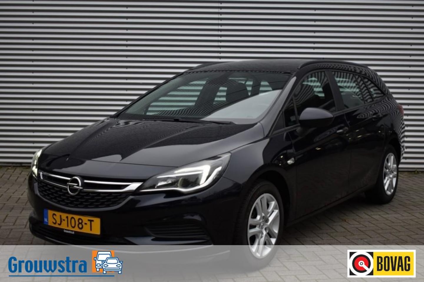 Opel Astra Sports Tourer - SPORTS TOURER 1.0 / ECC / NAVI + APPLE CARPLAY / PDC V+A - AutoWereld.nl