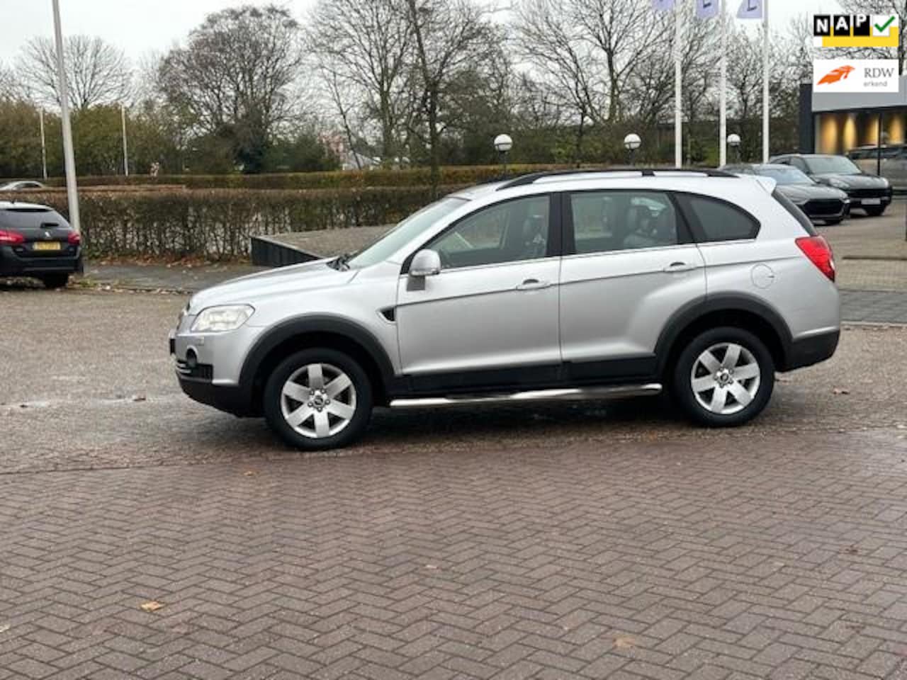 Chevrolet Captiva - 2.4i Executive 7 persoons,bj.2007,kleur:grijs,sportvelgen,leder,climate,NAP met 194700 km. - AutoWereld.nl