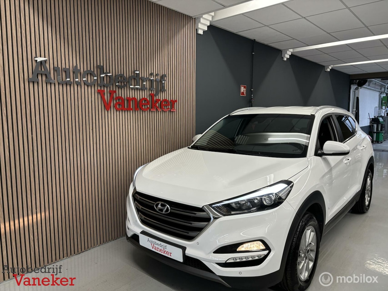 Hyundai Tucson - 1.6 GDi Premium Stoel/Achterbank verwarming|Navi|Cam - AutoWereld.nl