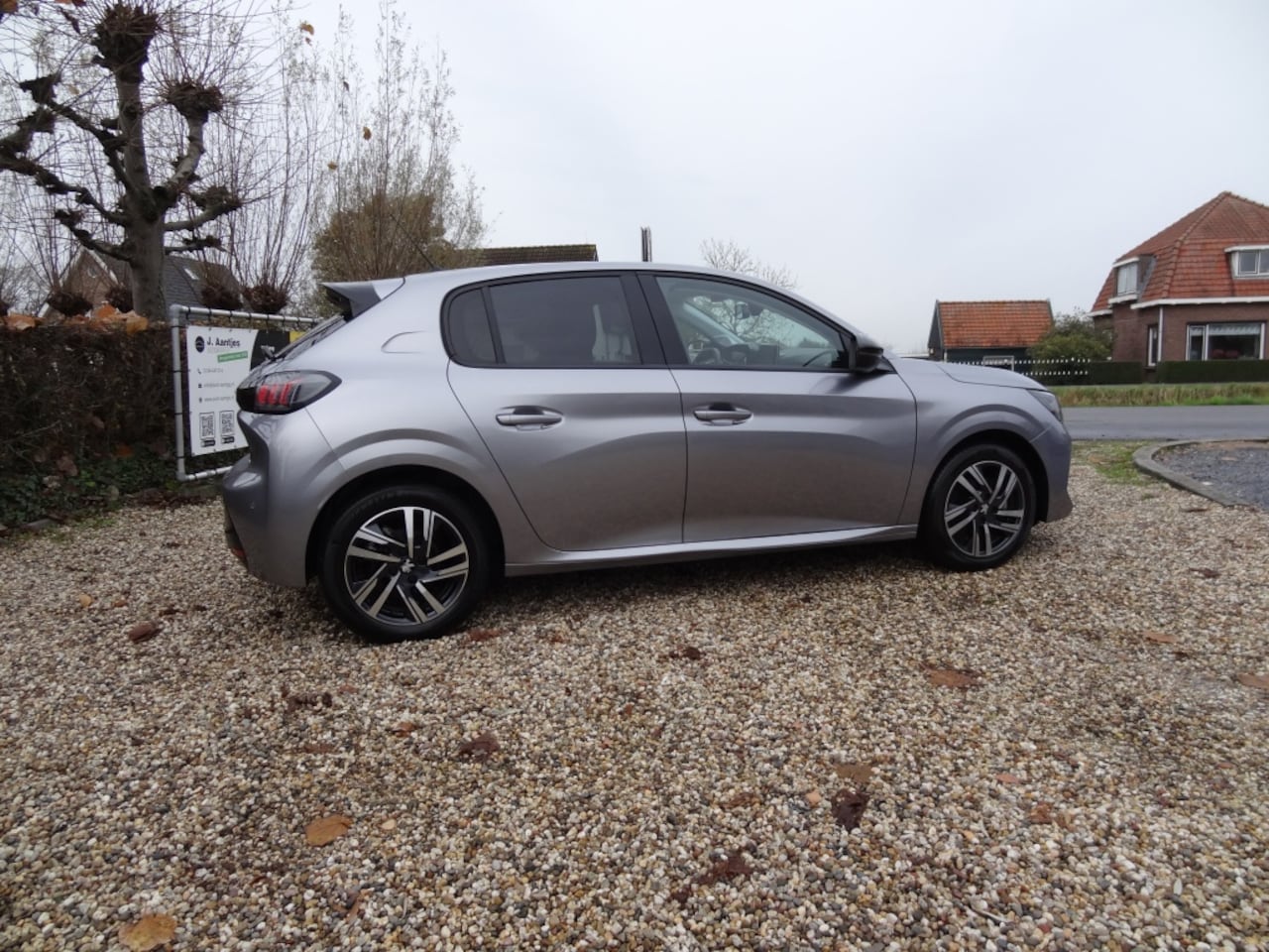 Peugeot 208 - 1.2 PT Aut. Allure Pack Navigatie