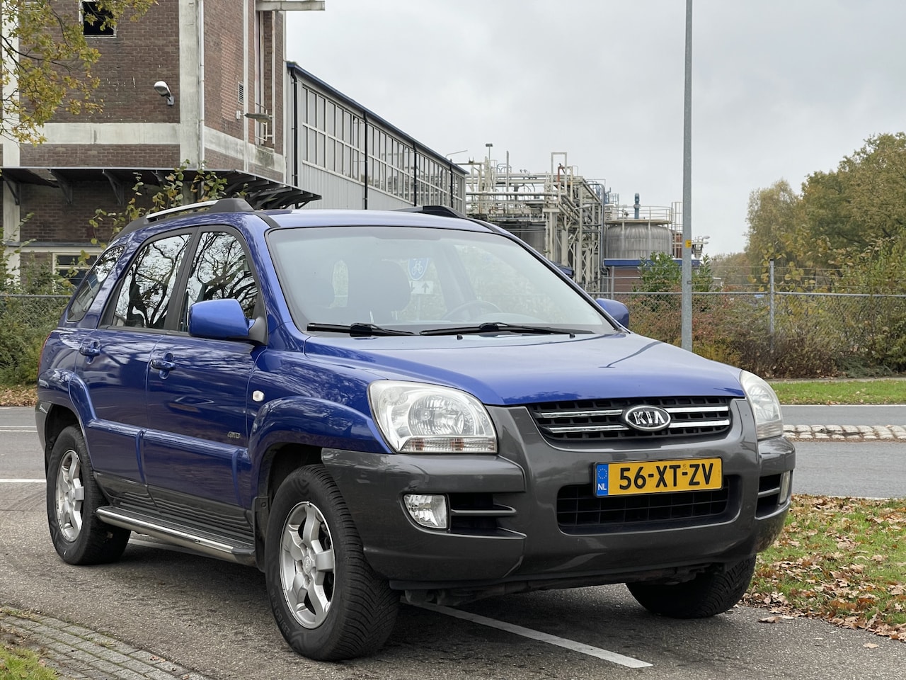 Kia Sportage - 2.7 V6 Adventure 4WD | Lederen Bekleding | Trekhaak | Set Winterbanden | Navigatie - AutoWereld.nl