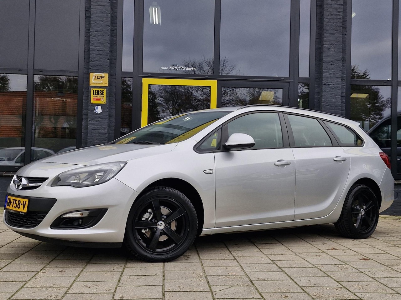 Opel Astra Sports Tourer - 1.4 Turbo Design Edition | Trekhaak | Climate Control | Cruise Control - AutoWereld.nl