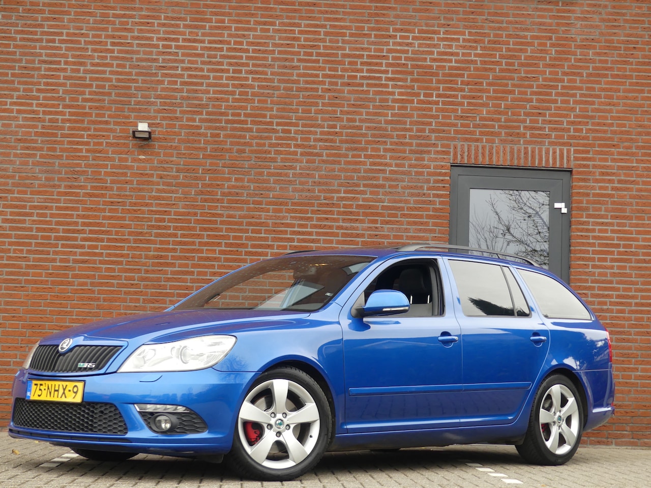 Skoda Octavia Combi - 2.0 TFSI RS / Schuifdak - AutoWereld.nl