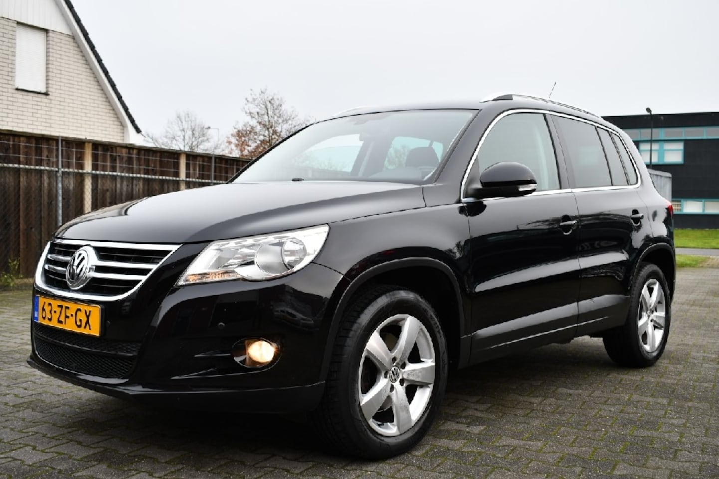 Volkswagen Tiguan - 1.4 TSI Sport&St. *4MOTION Airco | Trekhaak | Cruise - AutoWereld.nl