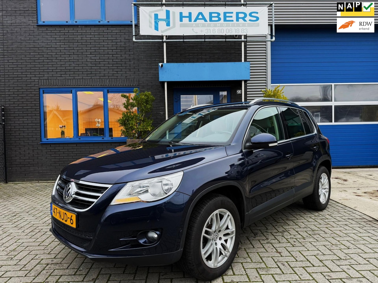 Volkswagen Tiguan - 2.0 TSI Sport&Style 4Motion 200PK|Origneel NL|Navi|Camera|Trekhaak|4x4|Leder|DSG|Flippers| - AutoWereld.nl