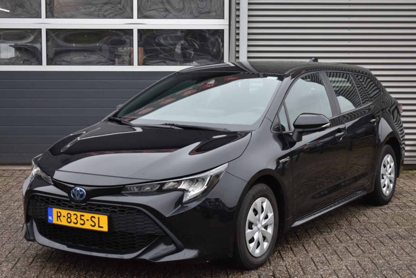 Toyota Corolla - 1.8 HYBRID / AUTOMAAT / STATION - AutoWereld.nl