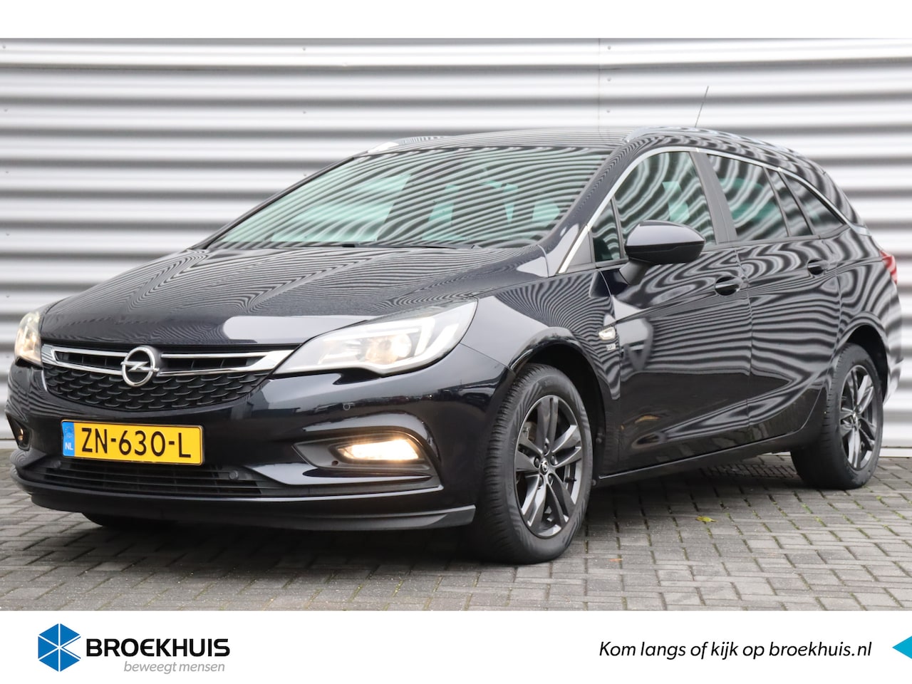 Opel Astra Sports Tourer - 1.0 TURBO 105PK 120 JAAR EDITION / NAVI / CLIMA / LED / PDC / 16" LMV / BLUETOOTH / CR - AutoWereld.nl