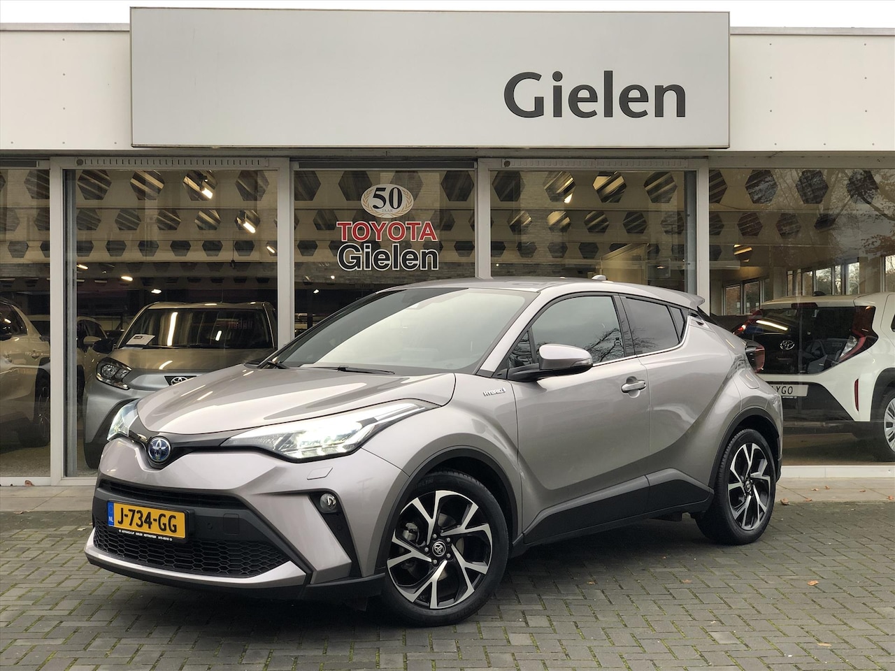 Toyota C-HR - 1.8 Hybrid Dynamic | Trekhaak, Stoel + Stuurverwarming, Apple CarPlay/Android auto, Parkee - AutoWereld.nl