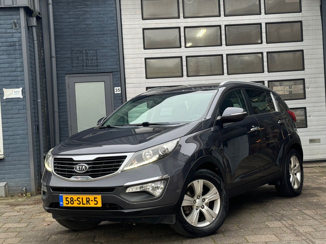 Kia Sportage - 1.6 GDI X-Ecutive Plus Pack | Clima | Cruise | PDC | N.A.P - AutoWereld.nl