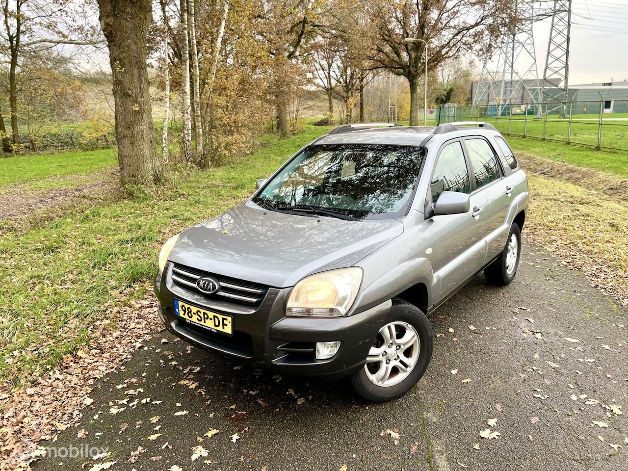 Kia Sportage - 2.0 Executive Clima Half-Leder Cruise NAP ✅ - AutoWereld.nl