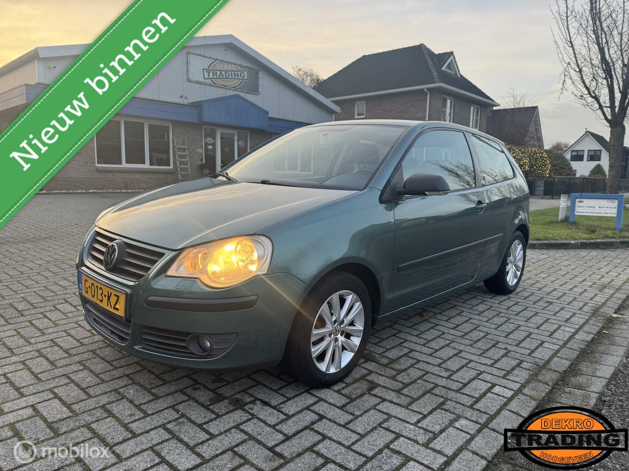 Volkswagen Polo - 1.2-12V Comfortline airco cruise stoelverwarming - AutoWereld.nl