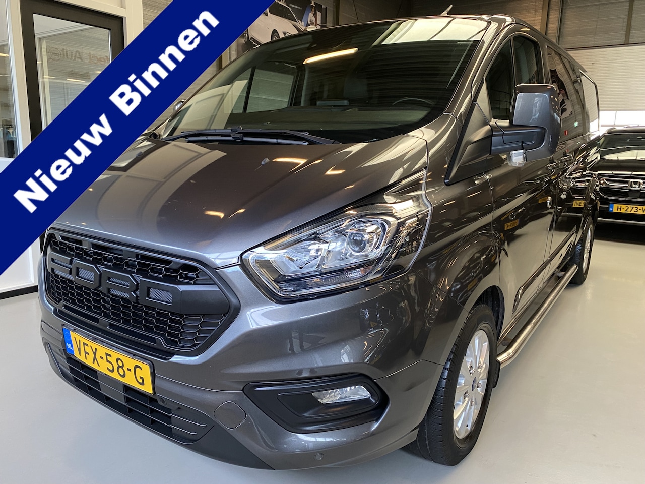 Ford Transit Custom - 320 2.0 TDCI L2H1 Limited DC 320 2.0 TDCI L2H1 Limited DC Leer, 170pk, Side bars - AutoWereld.nl