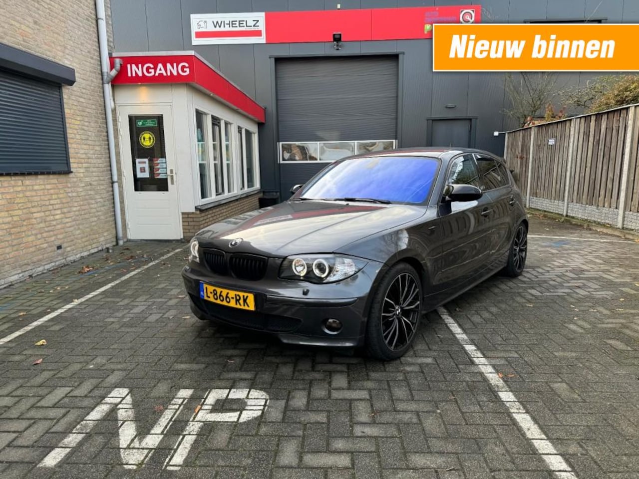 BMW 1-serie - 118 I 5 drs - airco - sportpakket - in zeer nette staat - AutoWereld.nl