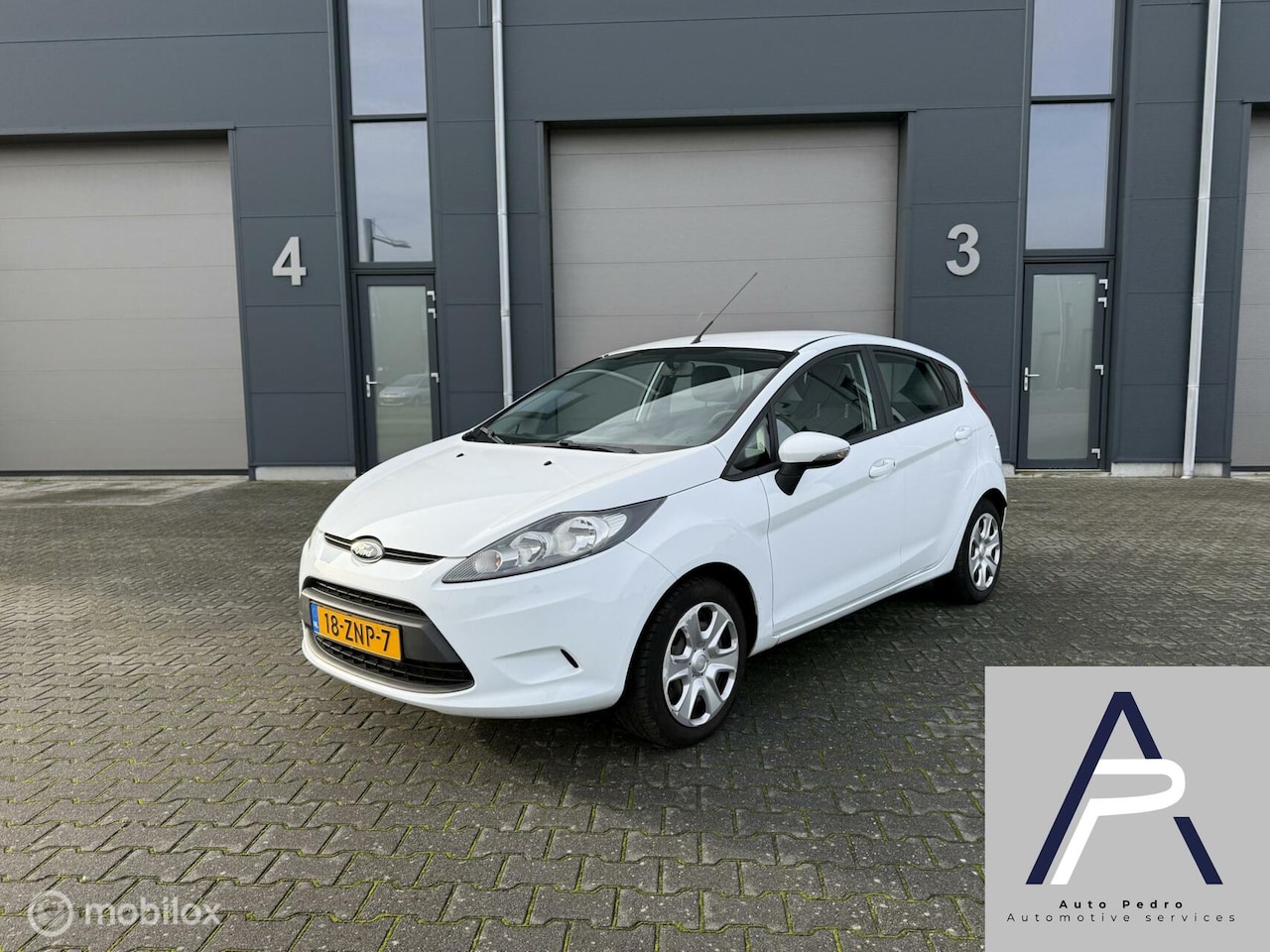 Ford Fiesta - 5-Deurs 1.25i Champions Edition wit 1e Eigenaar! - AutoWereld.nl