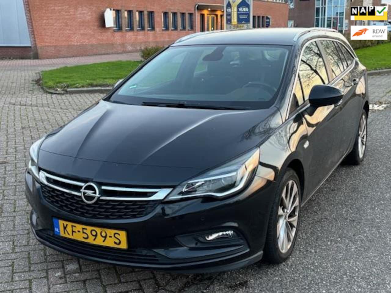 Opel Astra Sports Tourer - 1.0 Business+ Airco Electric pakket Audio/Navi Full map PDC Cruisecontrol LMV 17" Dealeron - AutoWereld.nl