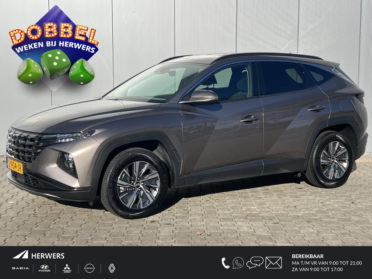 Hyundai Tucson - 1.6 T-GDI HEV Comfort / Stoelverwarming / Apple Carplay & Android Auto /  Achteruitrijcame - AutoWereld.nl