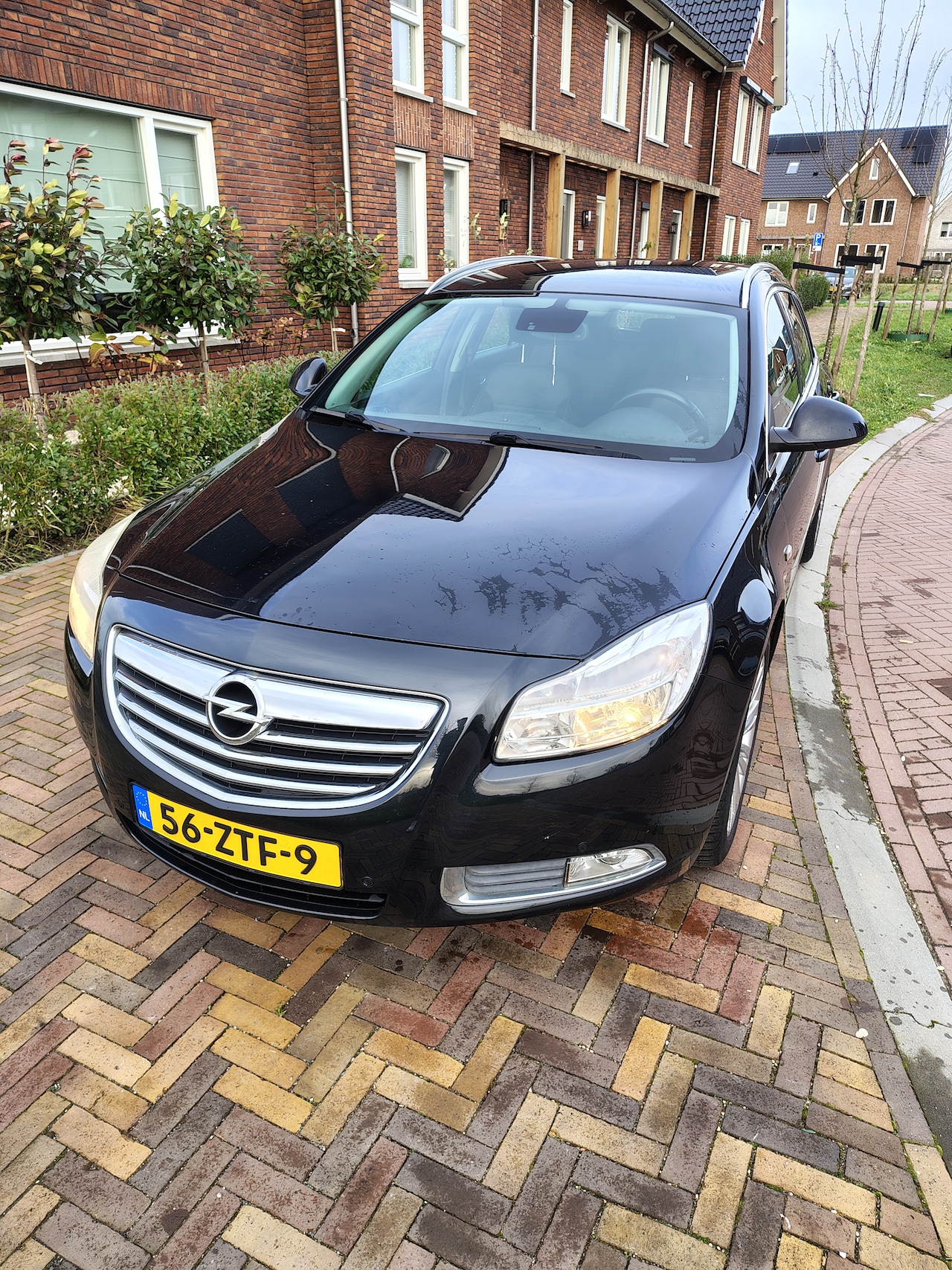 Opel Insignia Sports Tourer - 1.4 Turbo EcoFLEX Business+ - AutoWereld.nl