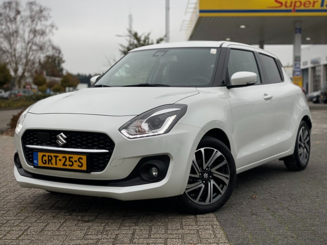 Suzuki Swift - 1.2 STYLE SMART HYBR - AutoWereld.nl