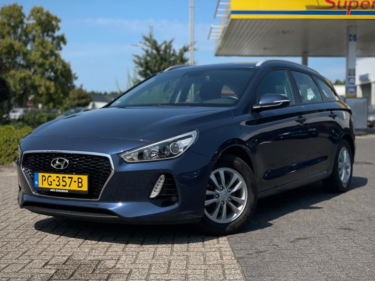 Hyundai i30 - 1.4 140 PK CAMERA NAVI PDC CRUISE ECC LM  NL AUTO - AutoWereld.nl