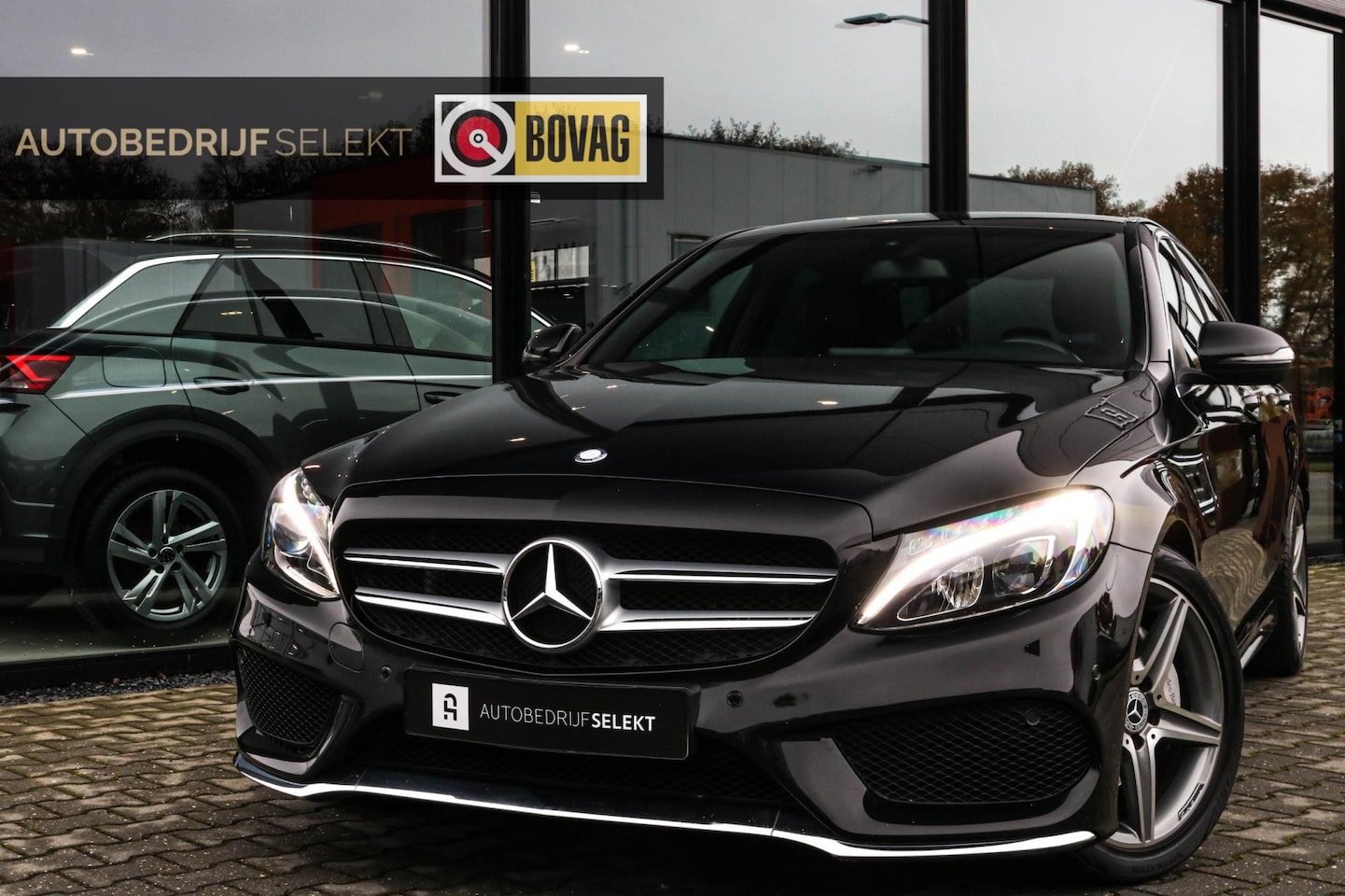 Mercedes-Benz C-klasse - 180 AMG - CAMERA - LED - LEER - SFEERVERLICHTING - AutoWereld.nl