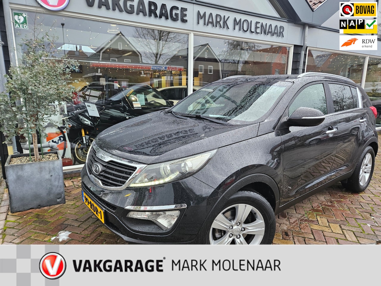 Kia Sportage - 1.6 GDI X-ecutive Plus Pack 1.6 GDI X-ecutive Plus Pack,panorama,camera,navi - AutoWereld.nl