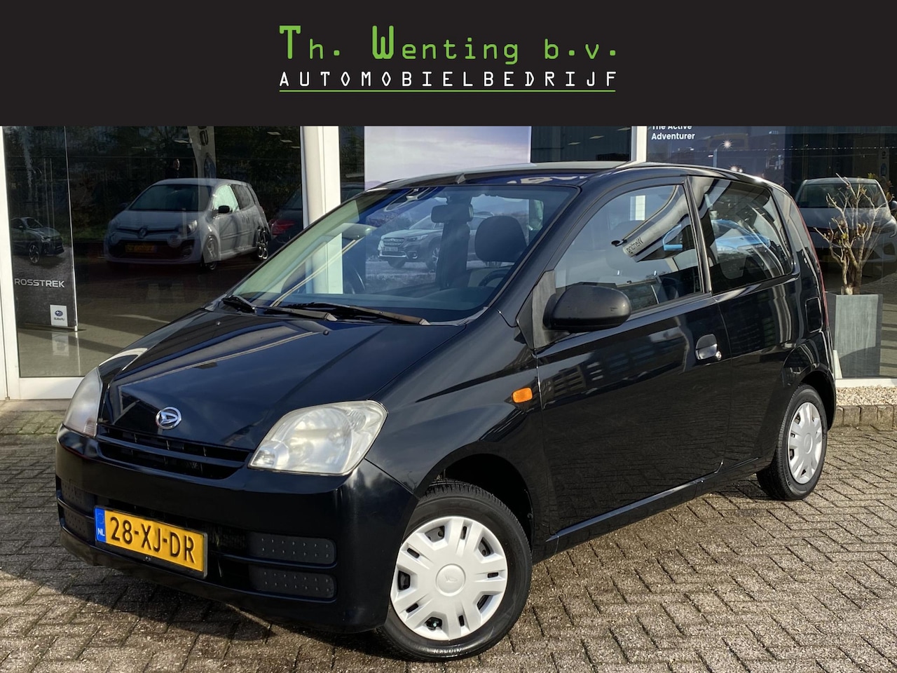 Daihatsu Cuore - 1.0-12V Tokyo | ABS | Airbags | Stuurbekrachtiging | Radio | 2 Sleutels | Lage kilometerst - AutoWereld.nl