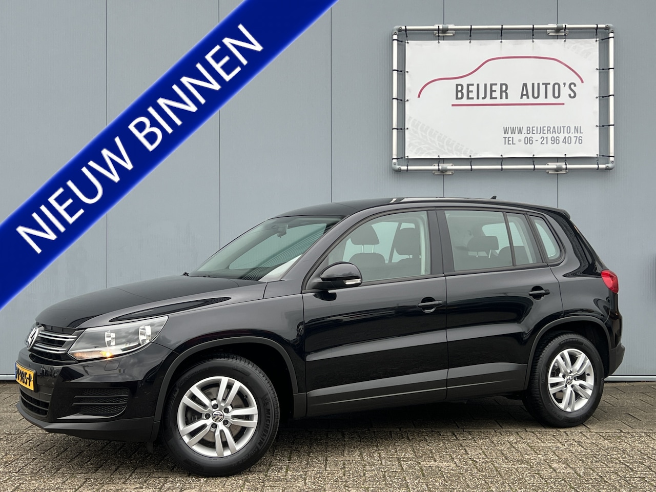 Volkswagen Tiguan - 1.4 TSI Comfort&Design Edition Trekhaak/Navi. - AutoWereld.nl