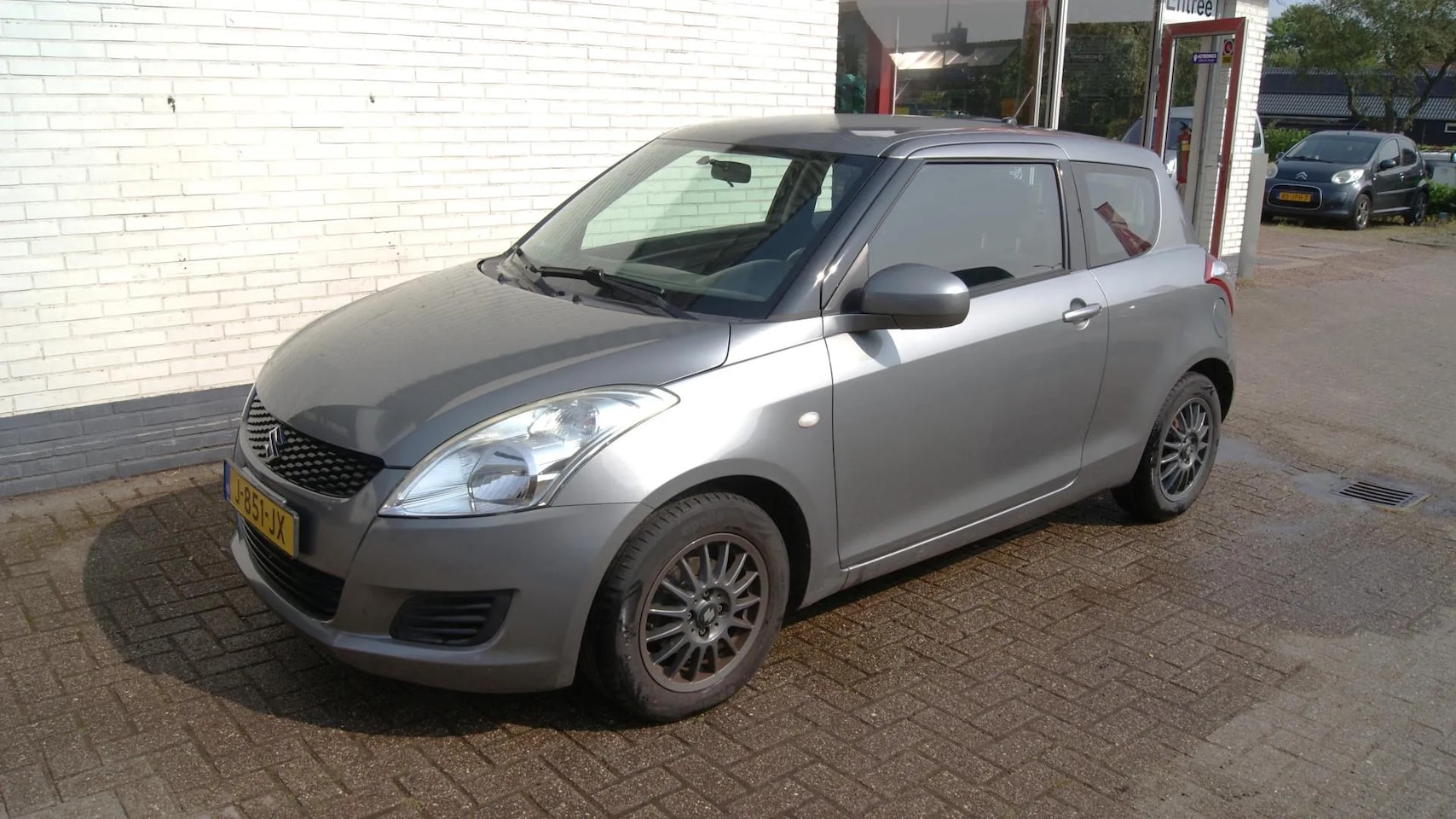 Suzuki Swift - 1.2 Comfort EASSS trekhaak/airco RIJKLAARPRIJS - AutoWereld.nl