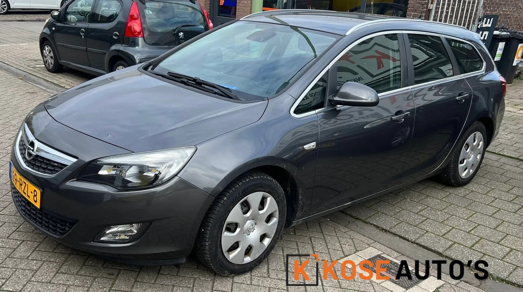 Opel Astra Sports Tourer - 1.4 Turbo Sport 1.4 Turbo Sport - AutoWereld.nl