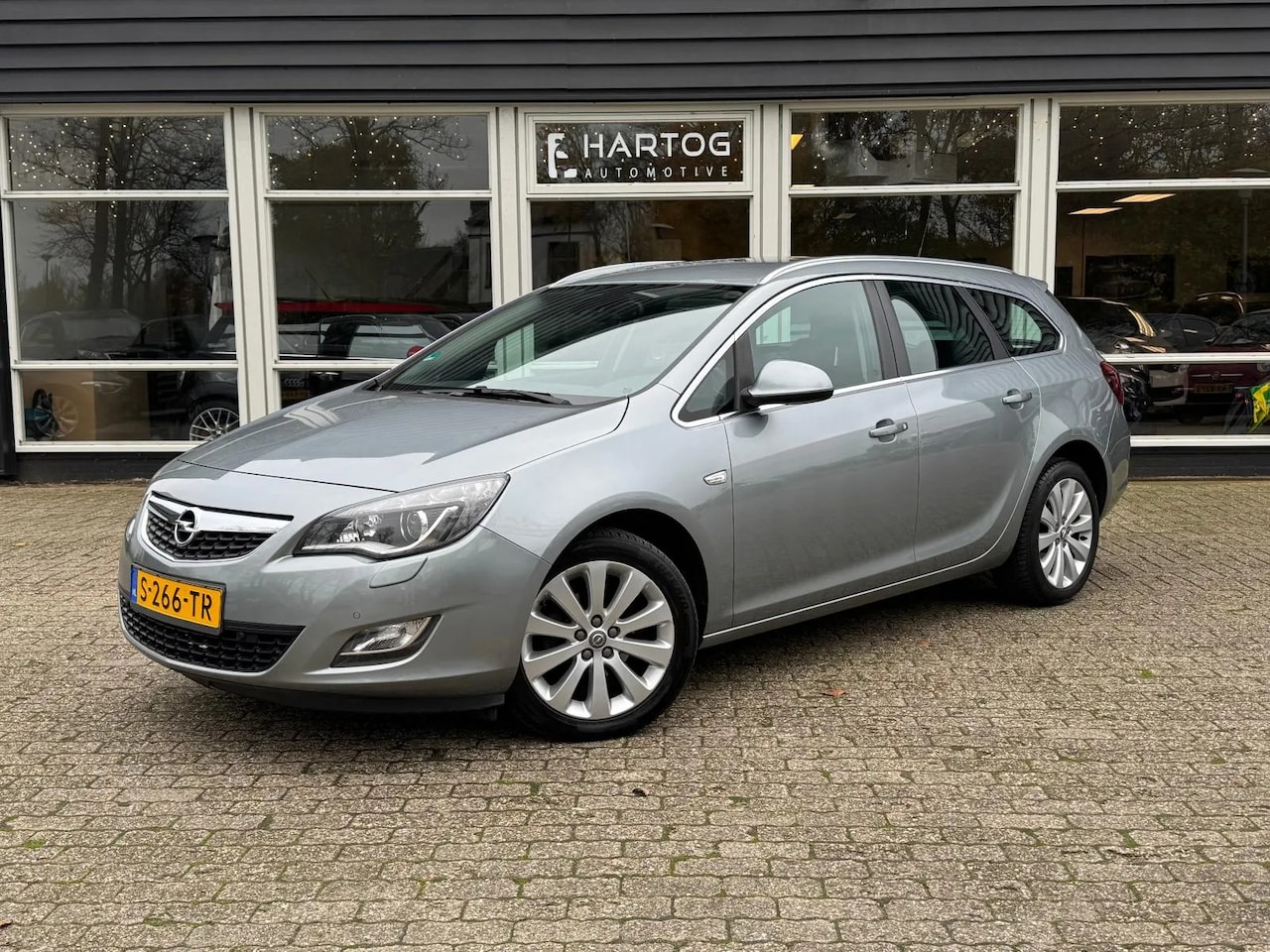 Opel Astra Sports Tourer - 1.4 Turbo Sport | Clima | Cruise | PDC | Autm | - AutoWereld.nl