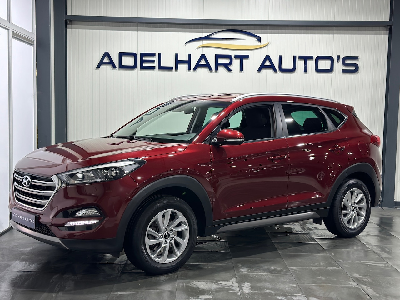 Hyundai Tucson - 1.6 GDi Comfort / Full map navigatie / Camera / Cruise control / Climate control / Stoelve - AutoWereld.nl