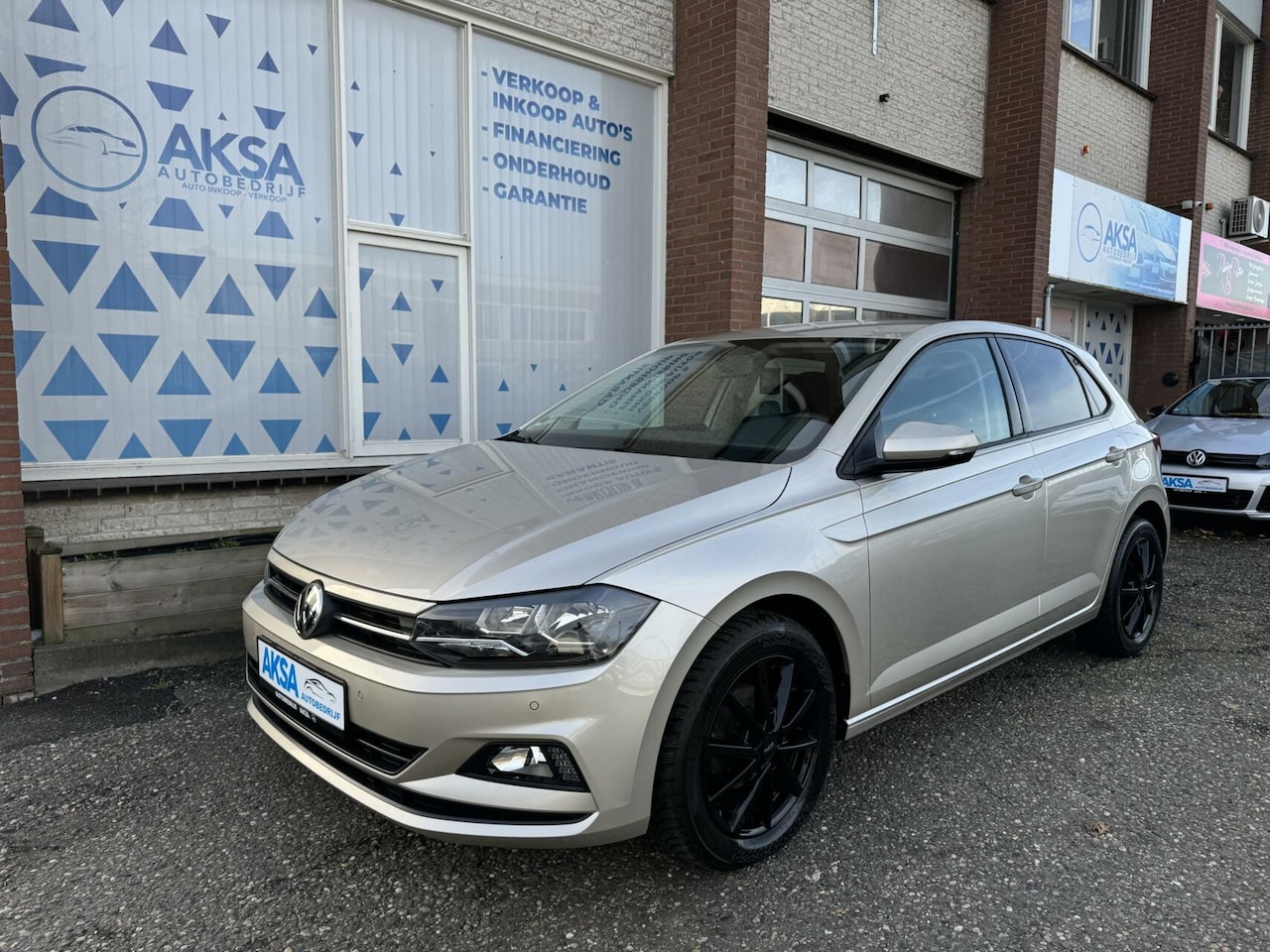 Volkswagen Polo - 1.0 TSI Comfortline Automaat/ACC/Garantie/16inch/Bluetooth/Stlvw/PDC - AutoWereld.nl