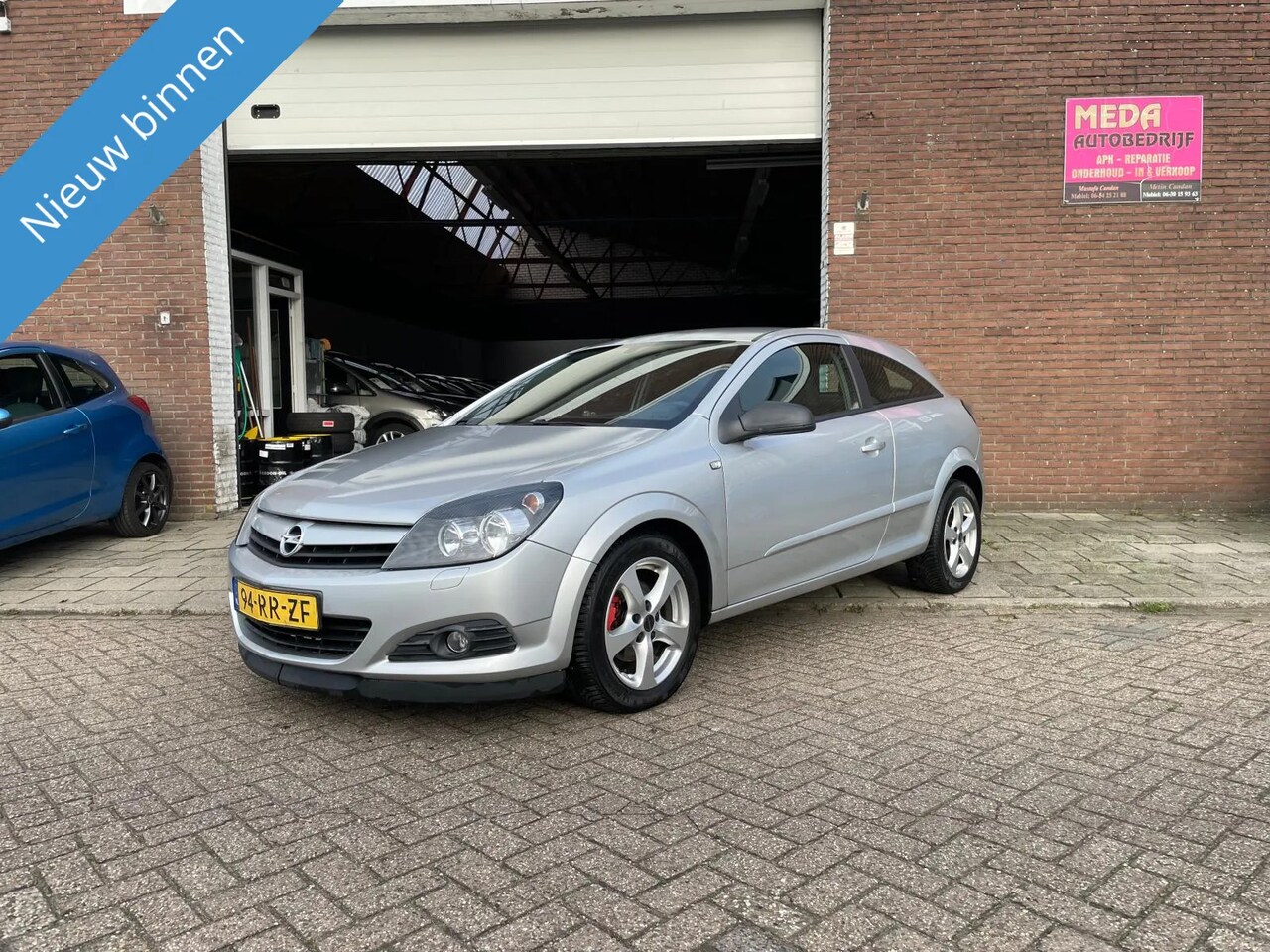 Opel Astra GTC - 1.6 Enjoy | Airco | Cruisecontrol - AutoWereld.nl