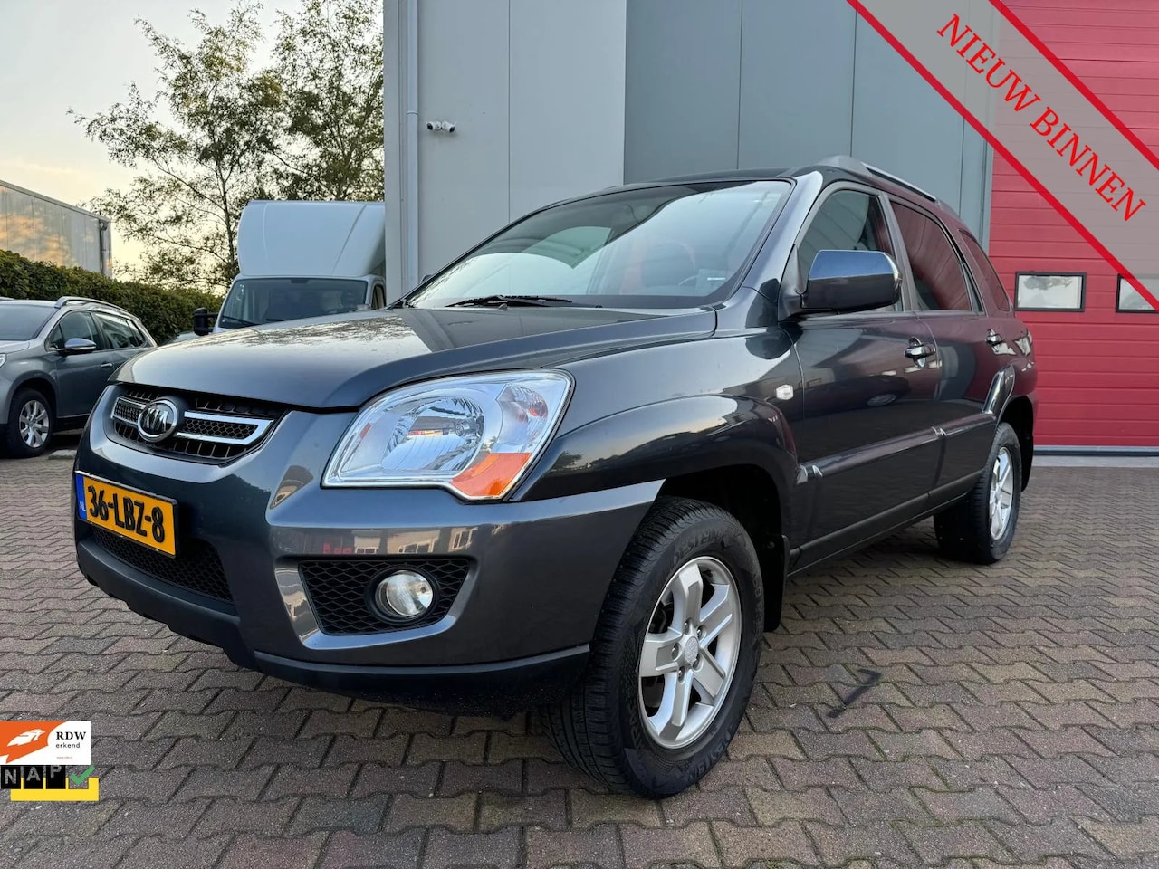 Kia Sportage - 2.0 CVVT X-tra 4WD 2.0 CVVT X-tra 4WD - AutoWereld.nl