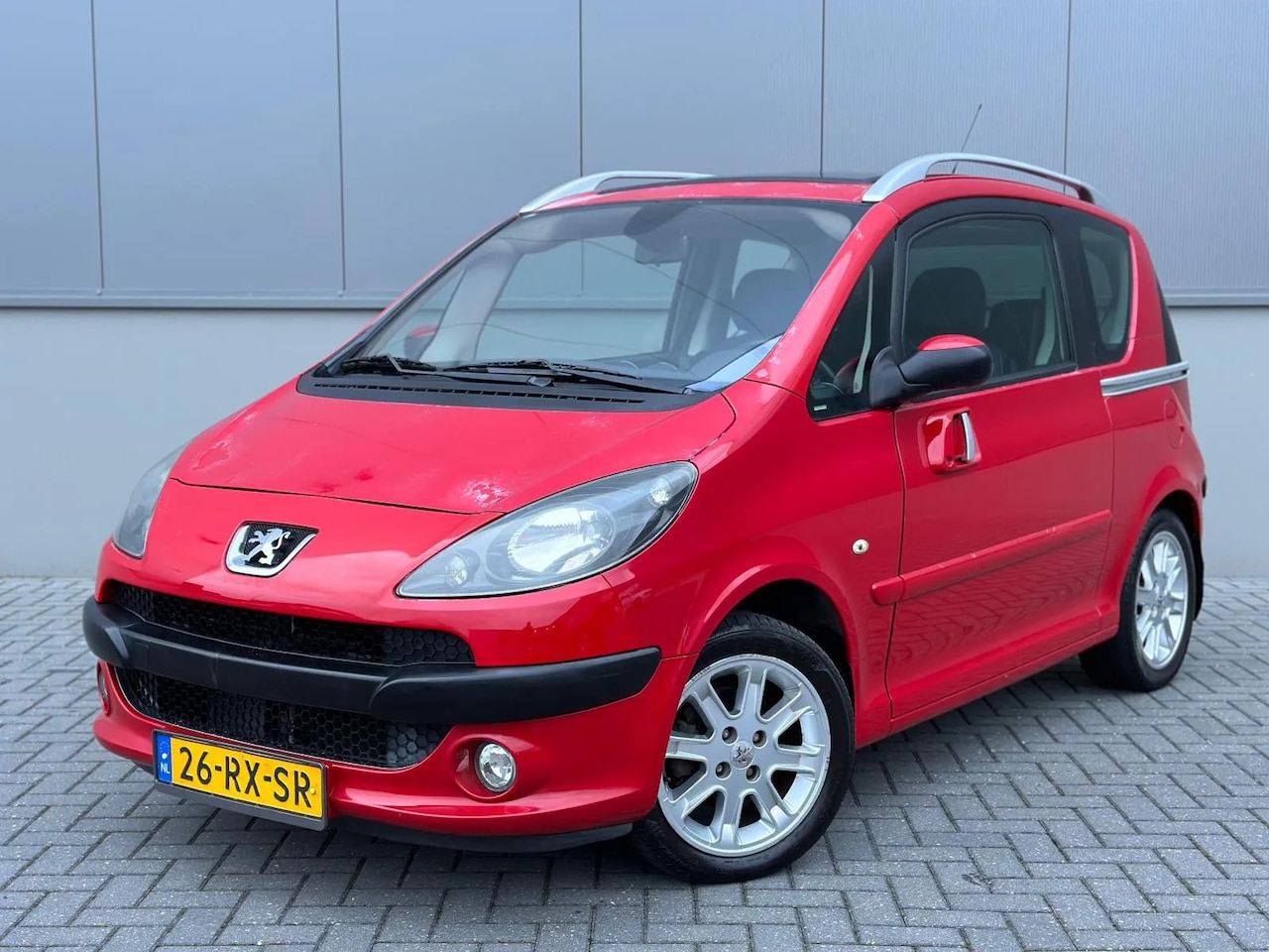 Peugeot 1007 - 1.6-16V Sporty 1.6-16V Sporty - AutoWereld.nl