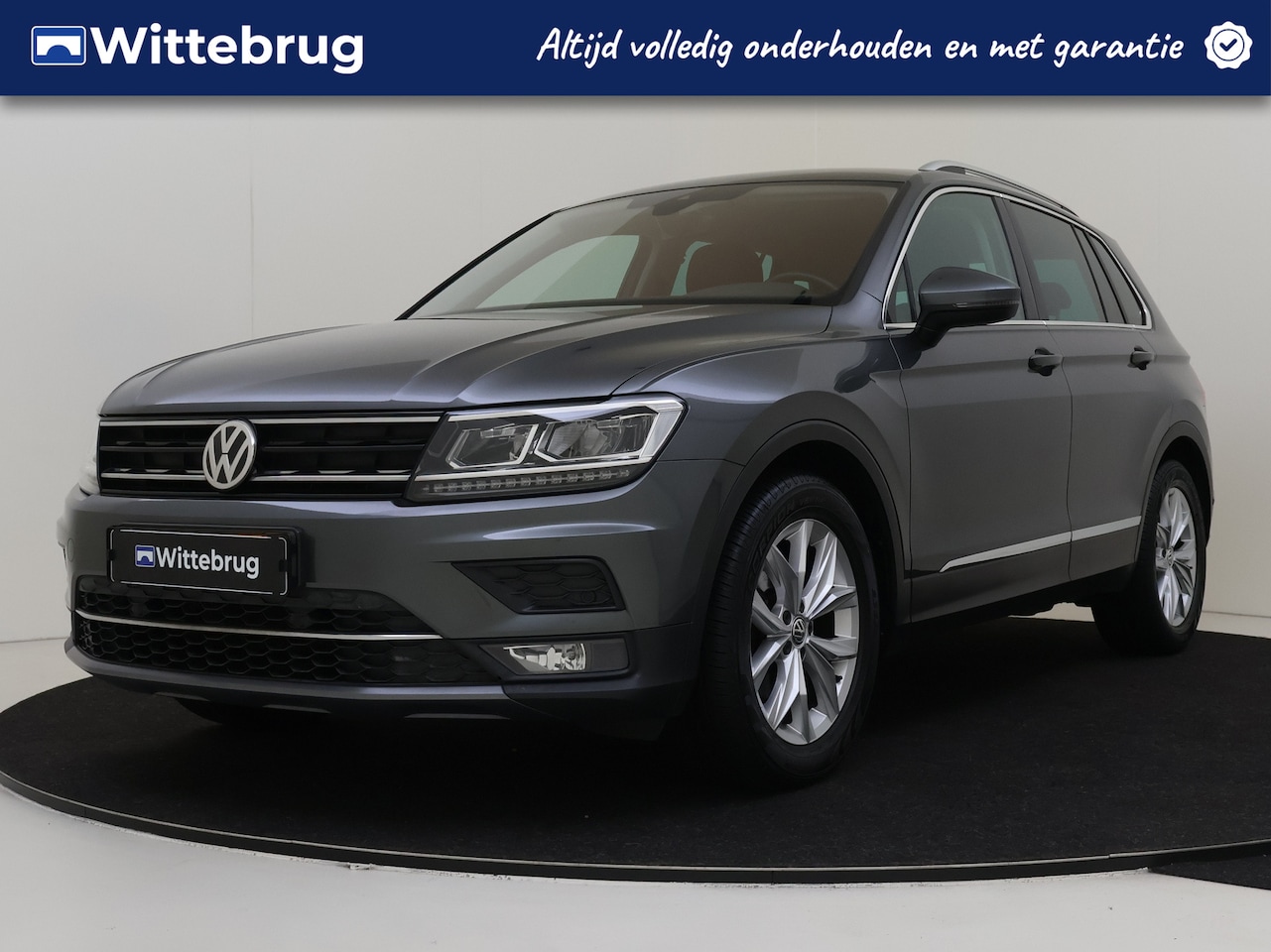 Volkswagen Tiguan - 1.4 TSI Highline | Navigatie | Trekhaak | Parkeerhulp voor en achter - AutoWereld.nl