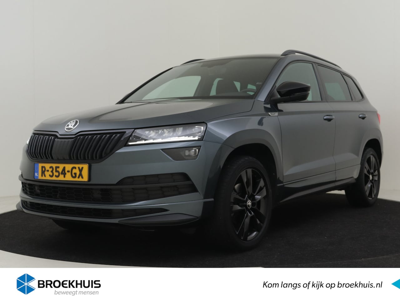 Skoda Karoq - 1.5 TSI ACT Sportline Business 150pk DSG/AUT | Adaptief cruise control | Navigatie | App c - AutoWereld.nl