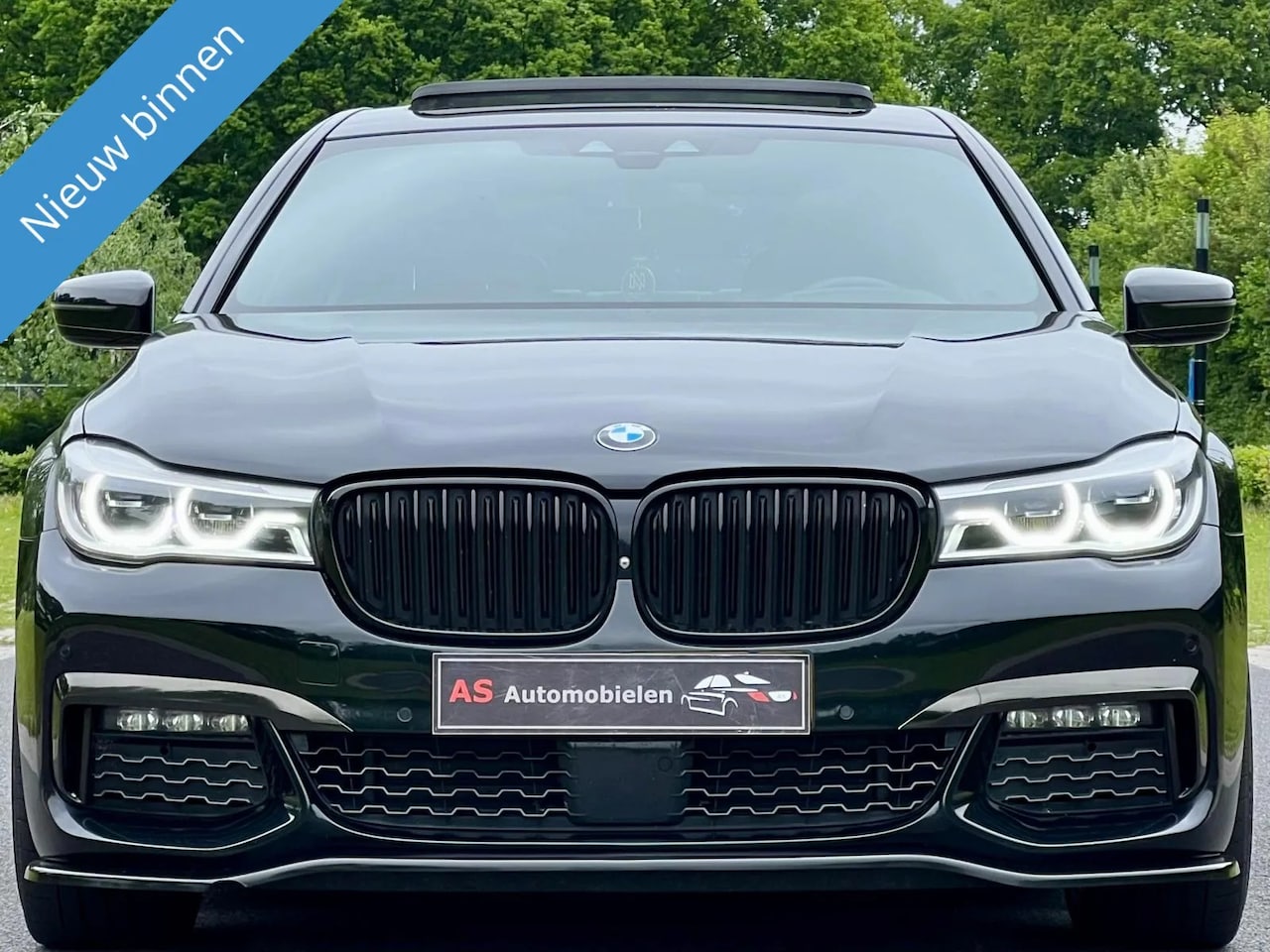 BMW 7-serie - 730Ld M-PERFORMANCE UNIEK SKY LOUNCH LANG - AutoWereld.nl