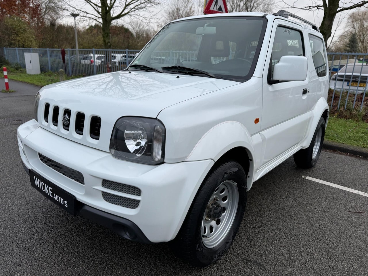 Suzuki Jimny - 1.3 JLX Automaat Trekhaak Airco STANDKACHEL 4X4 - AutoWereld.nl