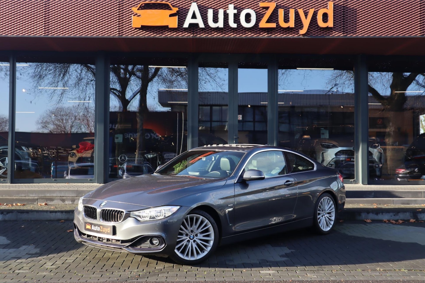 BMW 4-serie Coupé - 428i High Executive / Navi / Pano / Clima - AutoWereld.nl