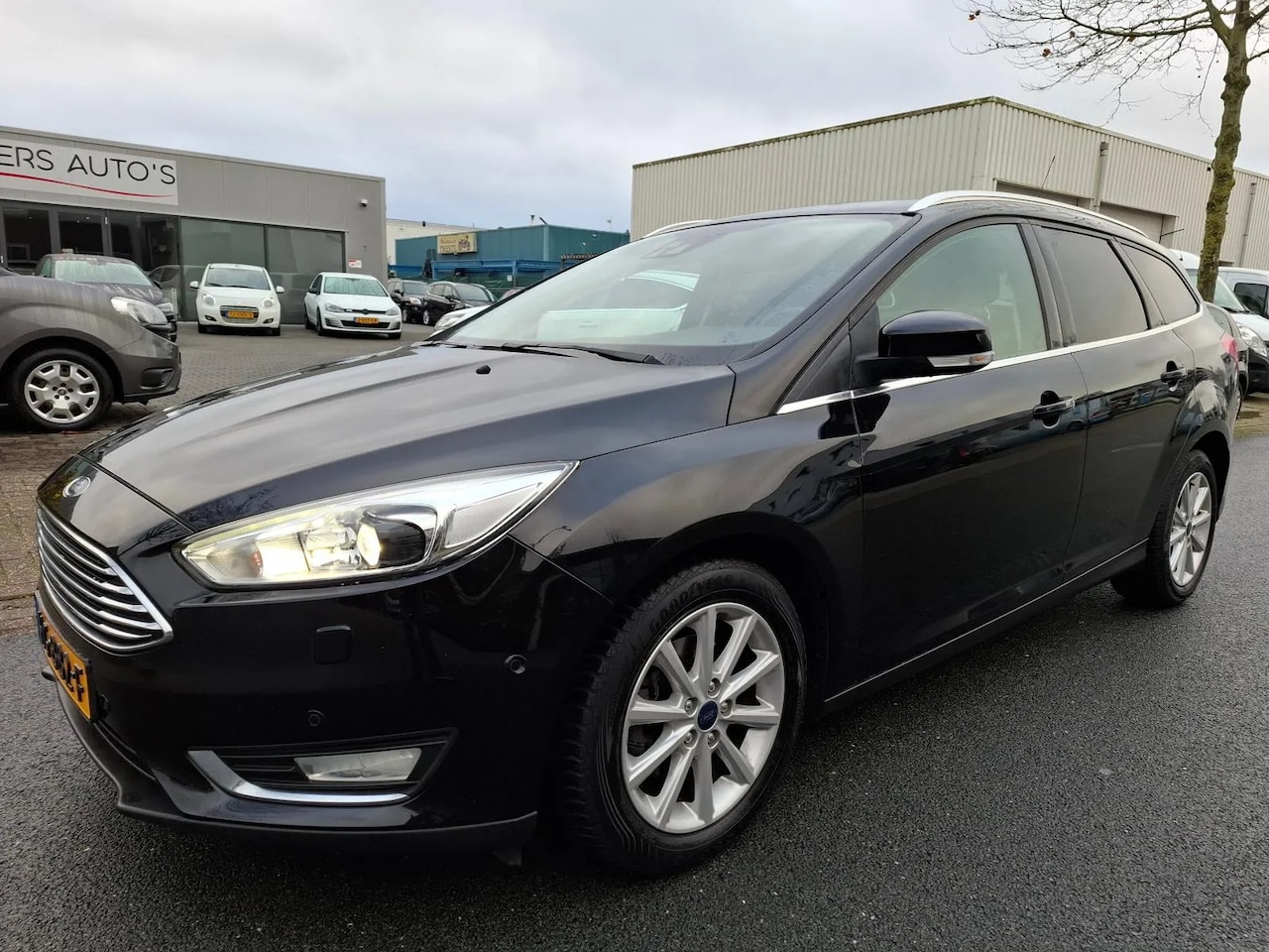 Ford Focus Wagon - 1.0 Titanium Edition CLIMA/NAVI/XENON/PDC! - AutoWereld.nl