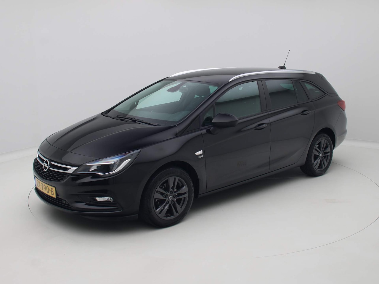 Opel Astra Sports Tourer - 1.4 Turbo 120 Jaar Edition 1.4 Turbo 120 Jaar Edition 150pk - AutoWereld.nl