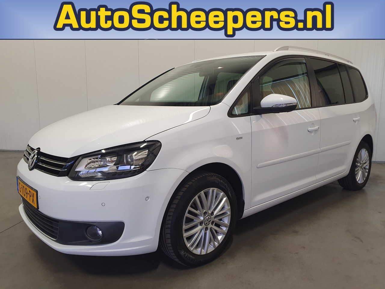 Volkswagen Touran - 1.2 TSI Highline BlueMotion NAVI/CAMERA/TRHAAK/PDC/LMV - AutoWereld.nl