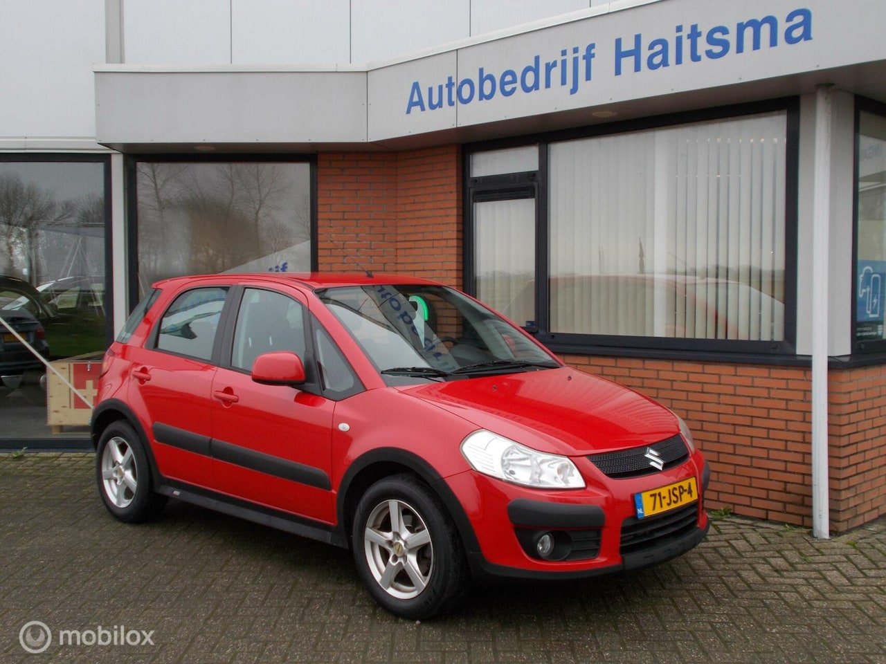 Suzuki SX4 - 1.6 Comfort Out Door Airco | tr.hk | LMV - AutoWereld.nl